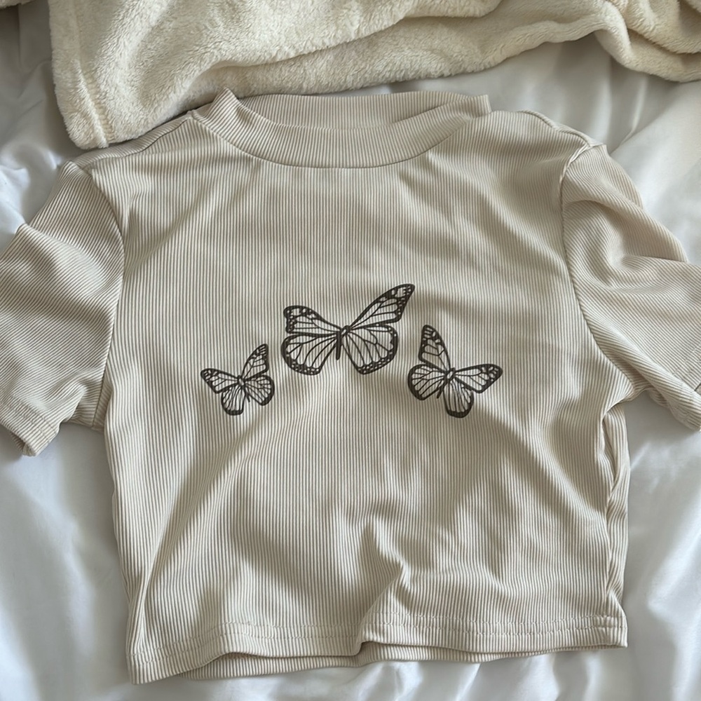 Tan cropped shirt with butterfly design